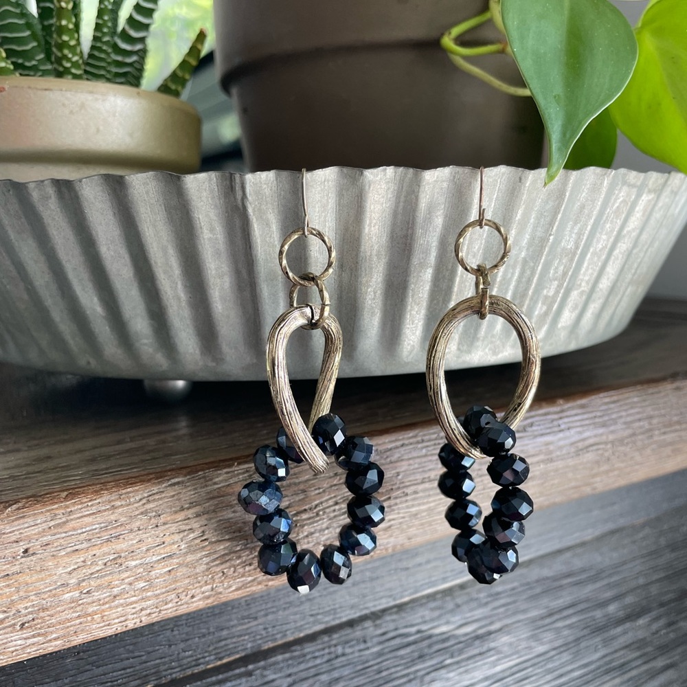 Black and gold dangling earrings